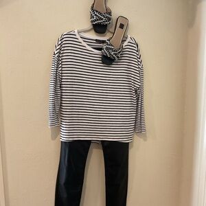 Comfy black and white striped tee shirt.